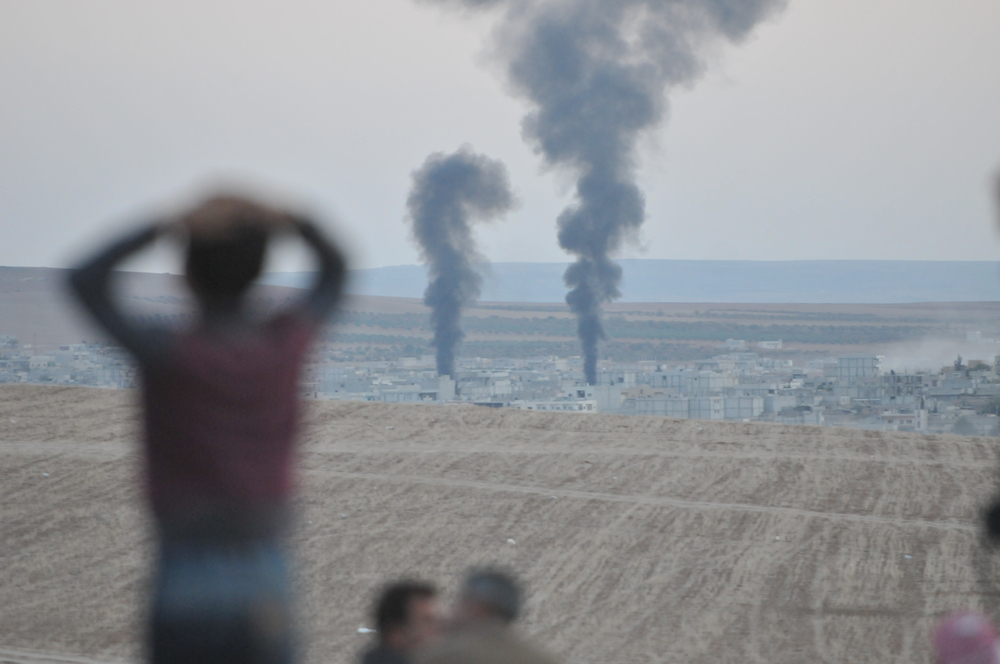 Coalition air strike in Syria (Orlok via Shutterstock)